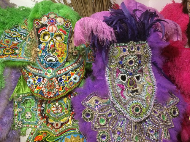 Hand-beaded masks and costumes